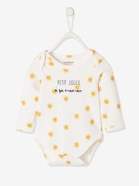 Click to view product details and reviews for Long Sleeve Bodysuit With Cutaway Shoulders For Babies White Print.