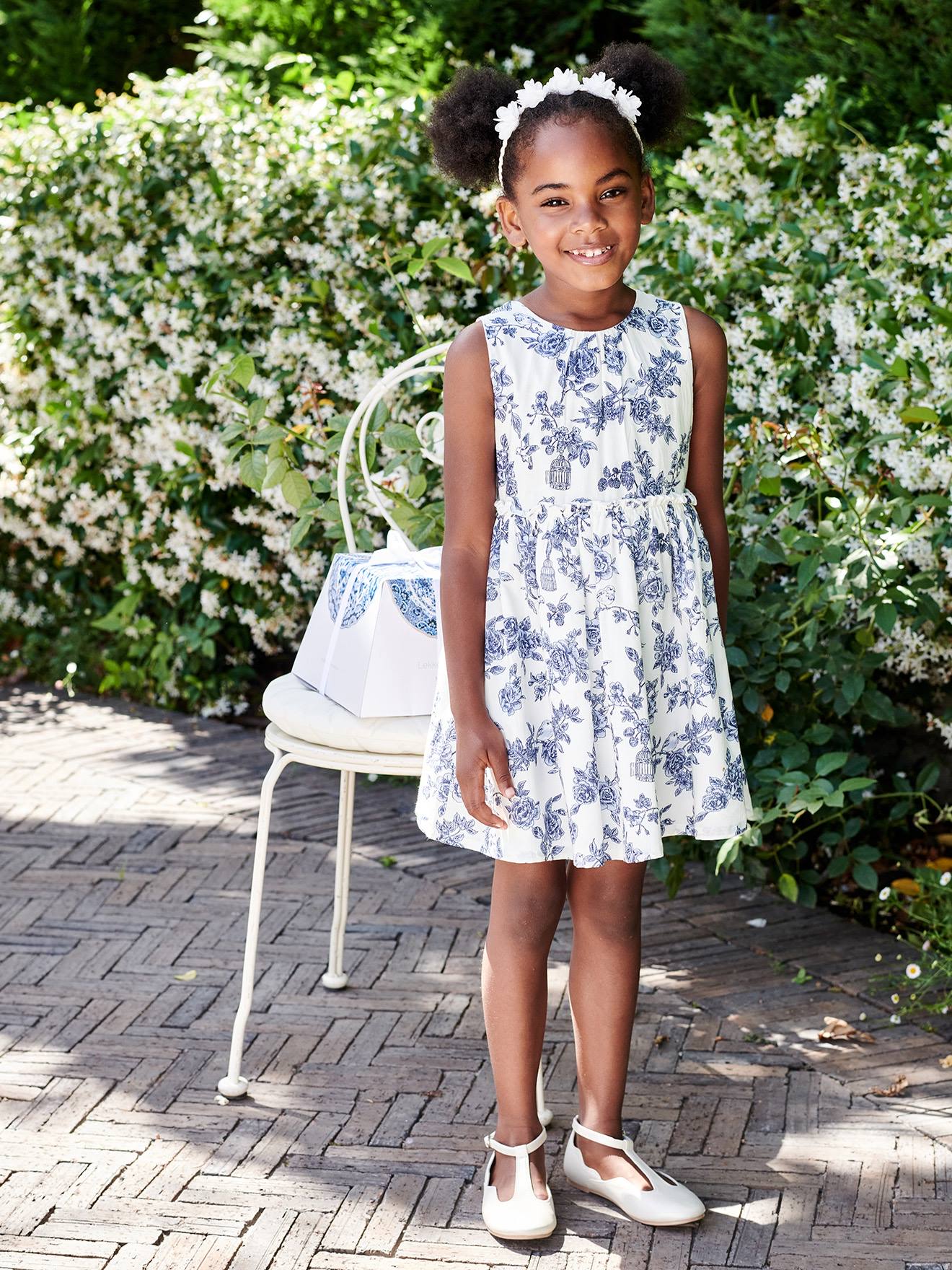 White Flower Girl Dress with blue waist band and bow on outlets back