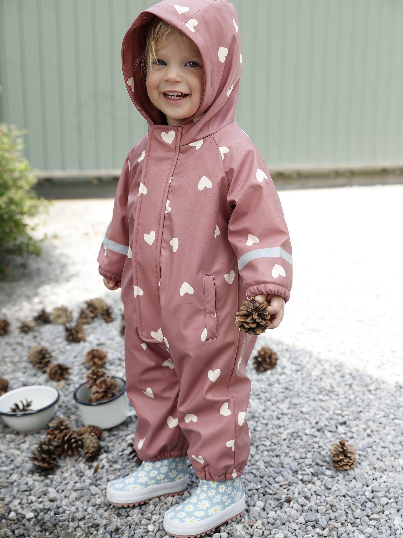 Fleece-lined baby's hooded printed rainsuit old rose