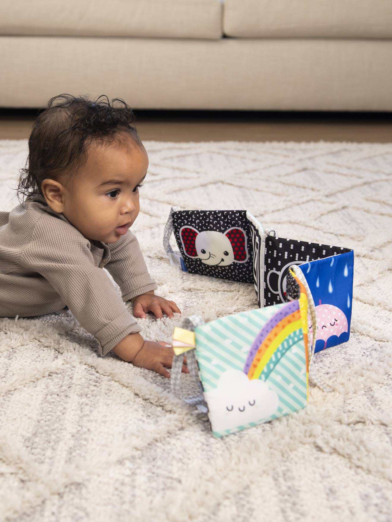 INFANTINO fabric book cot bumper multicoloured