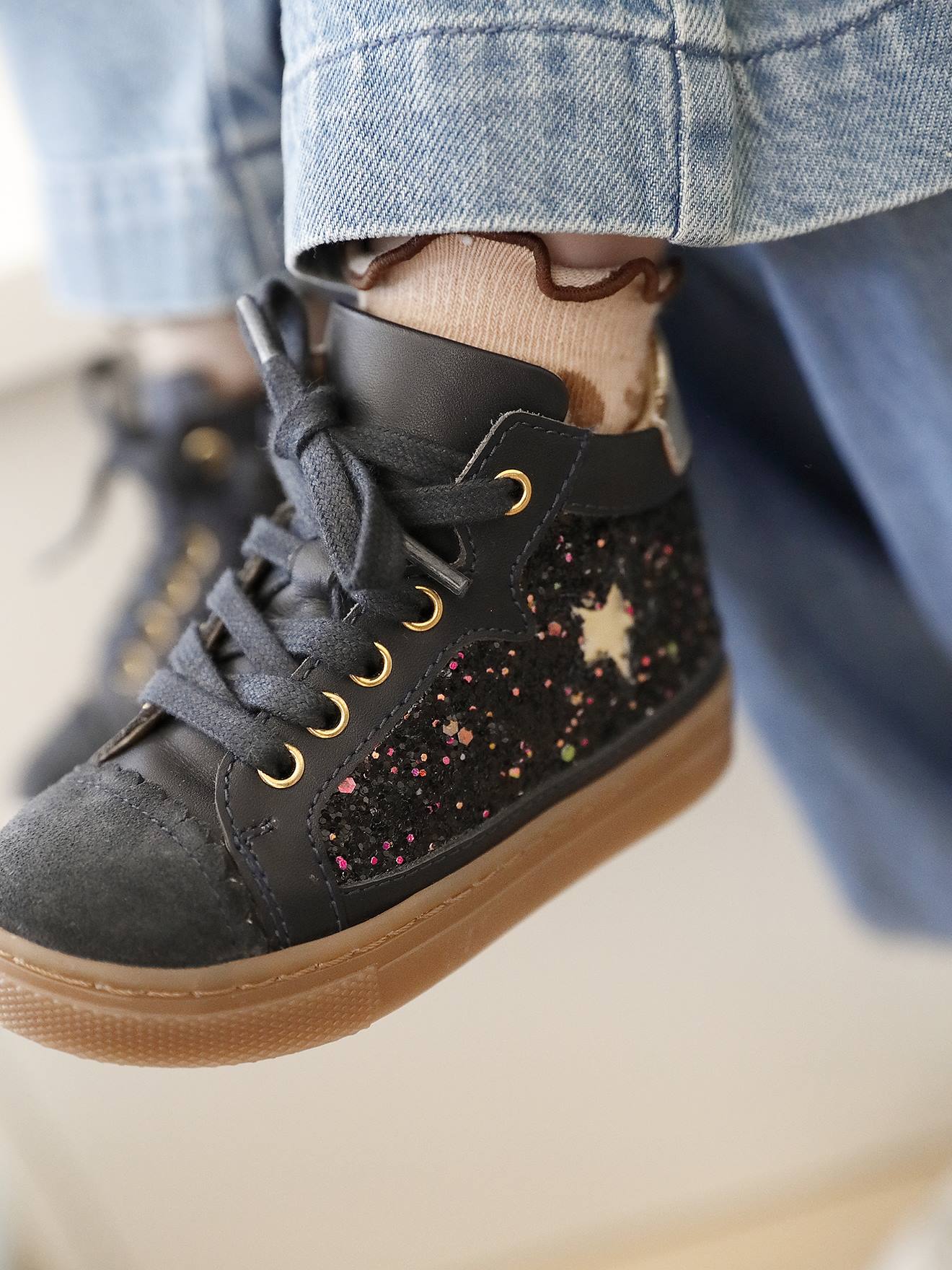 Lace-up and elasticated high-top leather trainers