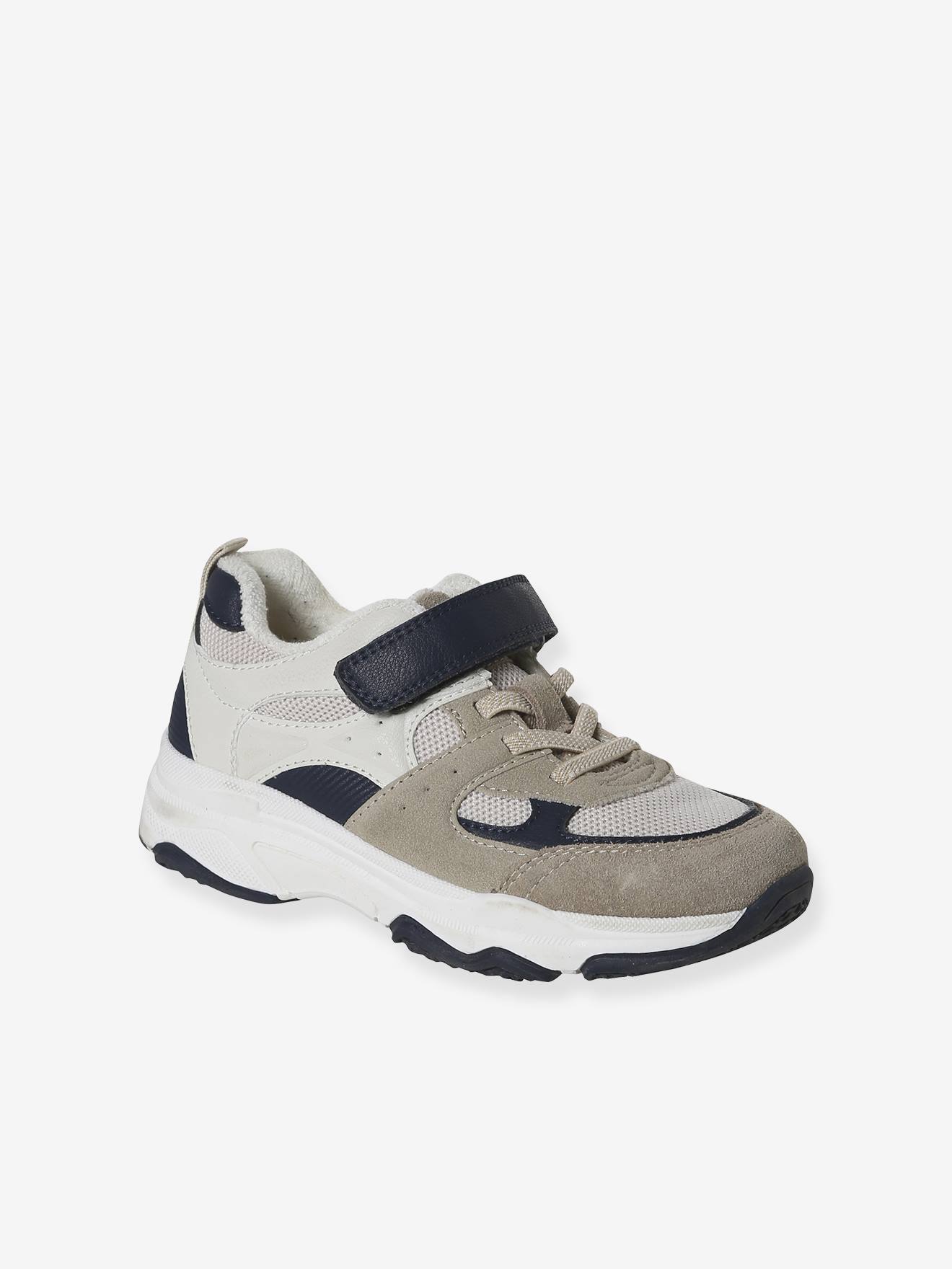 Trainers with elasticated laces and hook and loop fasteners for children